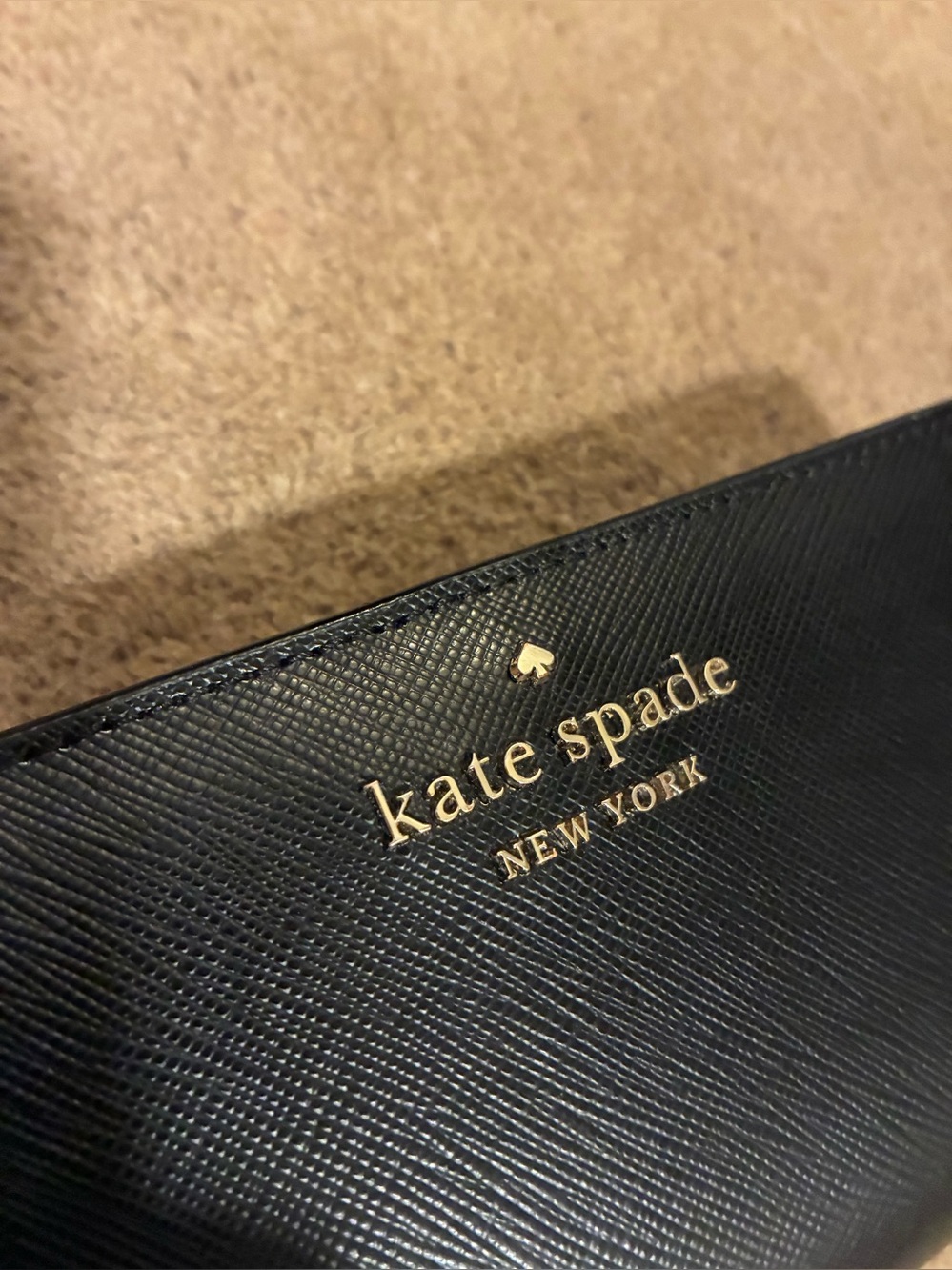 kate spade black leather wallet with gold logo